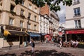 Montmartre Street with Cafes and People Royalty Free Stock Photo