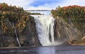 Montmorency Falls and Bridge in autumn with colorful trees, Quebec Royalty Free Stock Photo