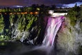 Montmorency illuminated colorful waterfalls from bottom looking