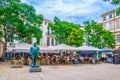 MONTPELLIER, FRANCE, JUNE 25, 2017: People are sitting at restaurants at Place jean Jaures in the center of Montpellier, France