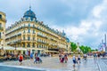 MONTPELLIER, FRANCE, JUNE 25, 2017: People are strolling on the place de la comedie in central Montpellier, France Royalty Free Stock Photo