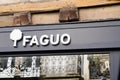 faguo logo sign and brand text of french shop Recycled clothing shoes facade Royalty Free Stock Photo