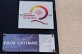 Qualite tourisme occitanie sud de France and pays cathare office wall logo label Royalty Free Stock Photo