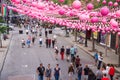 Montreal, CA - 14 August 2016: Pink balls across Rue Sainte Catherine in the Gay Village of Montreal with gay rainbow flags and m Royalty Free Stock Photo