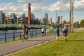 Cyclists and walkers along the Lachine Canal in Montreal, Canada Royalty Free Stock Photo