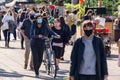 Many people wearing Coronavirus face masks at Jean Talon Market