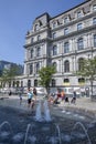 Montreal, Canada - aug 09 2023 - Children play in the waters of the Vauquelin fountain in downtown Montreal, Canada