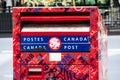 A bright red Canada Post mailbox Royalty Free Stock Photo