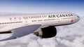 Montreal, Canada, December 15, 2021: Air Canada Boeing 777. The plane flies in the sky above the clouds Royalty Free Stock Photo