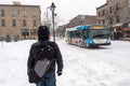 Pedestrian walking on Mont-Royal Avenue during snow storm Royalty Free Stock Photo