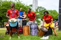 African American male and female percussionists playing djembe and dunun drums at Tam Tams festival in Mount Royal Park Royalty Free Stock Photo