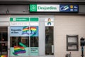 Desjardins Bank logo on their branch for the gay district le Village, with LGBT friendly slogan.