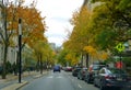 Montreal, Canada - October 27, 2019 - The view of the traffic surrounded by striking colors of fall foliage in the city