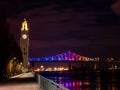 View of the Jacques-Cartier bridge illuminated with the colors of the rainbow concerning the covid-19