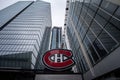 Montreal Canadiens logo, known as Canadiens de Montreal, in front of their main arena, the Centre Bell.