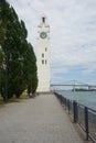 Montreal Clock Tower and Jacques Cartier Bridge at Old Port, Montreal, Canada. Background is a blue cloudy sky.