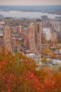 Vertical highrise modern buildings downtown, Montreal, Quebec, Canada during fall, yellow autumn leaves leaf, Saint Lawrence River