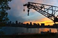 Montreal Downtown skyline at the time between sunset and twilight. Reflections of sun rays on Saint Laurent river.