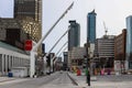 Montreal modern architecture - urban style, high-rise buildings, glass and concrete, street, empty road, cloudy day Royalty Free Stock Photo