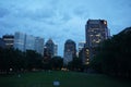 Montreal, QC, Canada - 7-15-2021: A skyline of Downtown, Sherbrooke street at the twilight blue hour. Foreground is McGill Royalty Free Stock Photo