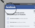 Montreal, Quebec, Canada - August 07 2019 : Facebook homepage with the logo in a magnifying glass