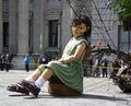 The little giant girl sleeping in Place d`arme