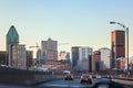 Montreal, Quebec, Canada - March 11, 2016: Evening in downtown Montreal city, early sunset. Road view. Royalty Free Stock Photo