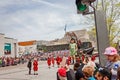 Montreal, Quebec, Canada - May 21, 2017: The crowd looking at little girl Giant walking marionette