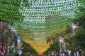 Montreal, Quebec, Canada, September 29, 2018: Iconic pink rainbow balls hanging over the village in Sainte-Catherine street of