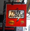 Sign of restaurant Frite Alors. Royalty Free Stock Photo