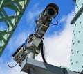 View of security camera hanging among wire in guarded city bridge Jacques Cartier