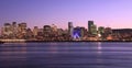 Montreal skyline at dusk with reflections in Saint Lawrence River, including newest skyscrapers in Quebec Royalty Free Stock Photo