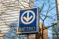 Montreal STM metro sign with trees