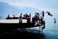 MONTREUX, SWITZERLAND - MAY 28, 2017: People enjoy relaxing and jumping into Lake Geneva.