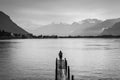 Travel woman standing on the wood bridge, Lake Geneva