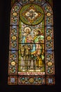 Montserrat, Spain, June 23, 2019: Stained glass window in the Benedictine monastery in Montserrat in Spain showing Jesus, Mary and