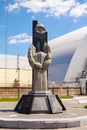 Monument against the background of the 4th reactor in the Chernobyl exclusion zone