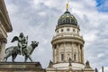 Monument of bronze angel playing harp on Gendarmenmarkt, Berlin