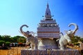 The monument built with ceramic tea cups in the shape of 4 elephants standing around the pagoda,the Chinese friendship withLaos