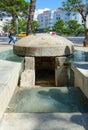 Monument-bunker TR-V-76851, on background - hotel Rogner, Tirana, Albania Royalty Free Stock Photo