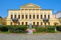 Monument-bust to the Russian writer A.S. Pushkin before the entrance to the library-reading room named after Pushkin