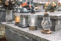 Monument and candles in the cemetery. All Saints Day in Poland. Candle in the cemetery. Flame in the cemetery. Royalty Free Stock Photo