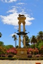 Monument of Christopher Columbus decorated with the prows of two ships and a lion in the garden de Murillo in Seville, capital of Royalty Free Stock Photo