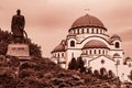 Monument comemorating Karageorge and orthodox temple of Saint Sava. Belgrade, Serbia. Sephia Royalty Free Stock Photo