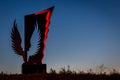 Monument of the Dead Motorcyclist in shape of an eagle in Varna, Bulgaria against the evening sky
