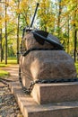 Russia, Kronstadt, September 2020. Iron anchor on a granite boulder as a monument to Russian sailors.