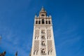 Monument of the giralda of seville in the gothic cathedral. It can be seen rising into the blue sky of the city. It is the largest