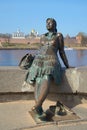 Monument girl-tourist close up, april day. Veliky Novgorod