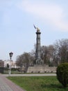 The monument of Glory cast-iron column with the bronze parts and the eagle. Poltava. Ukraine. Royalty Free Stock Photo