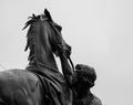 Monument horse and man in the rain